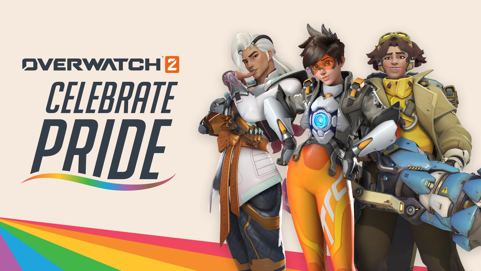 Die Held*innen Lifeweaver, Tracer und Venture stehen vor einem Pride-Regenbogen.